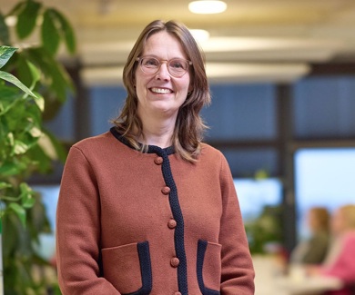 Women standing in an office